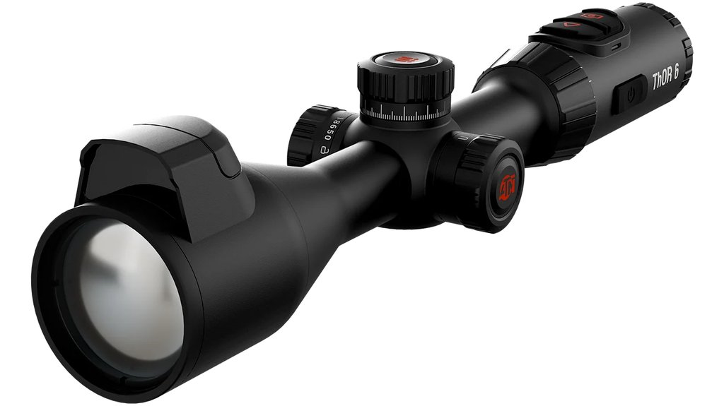 Studio photograph of the ATN ThOR 6 LRF 640x512 3-24x thermal rifle scope at a three-quarter angle showing the magnesium alloy body and integrated laser rangefinder